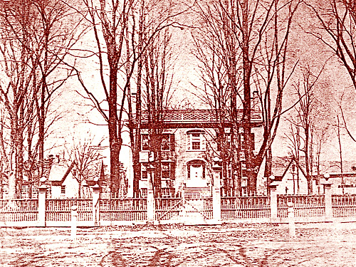 Vanderpool House in Kinderhook with typical Federal style doorway and early nineteenth century fence
